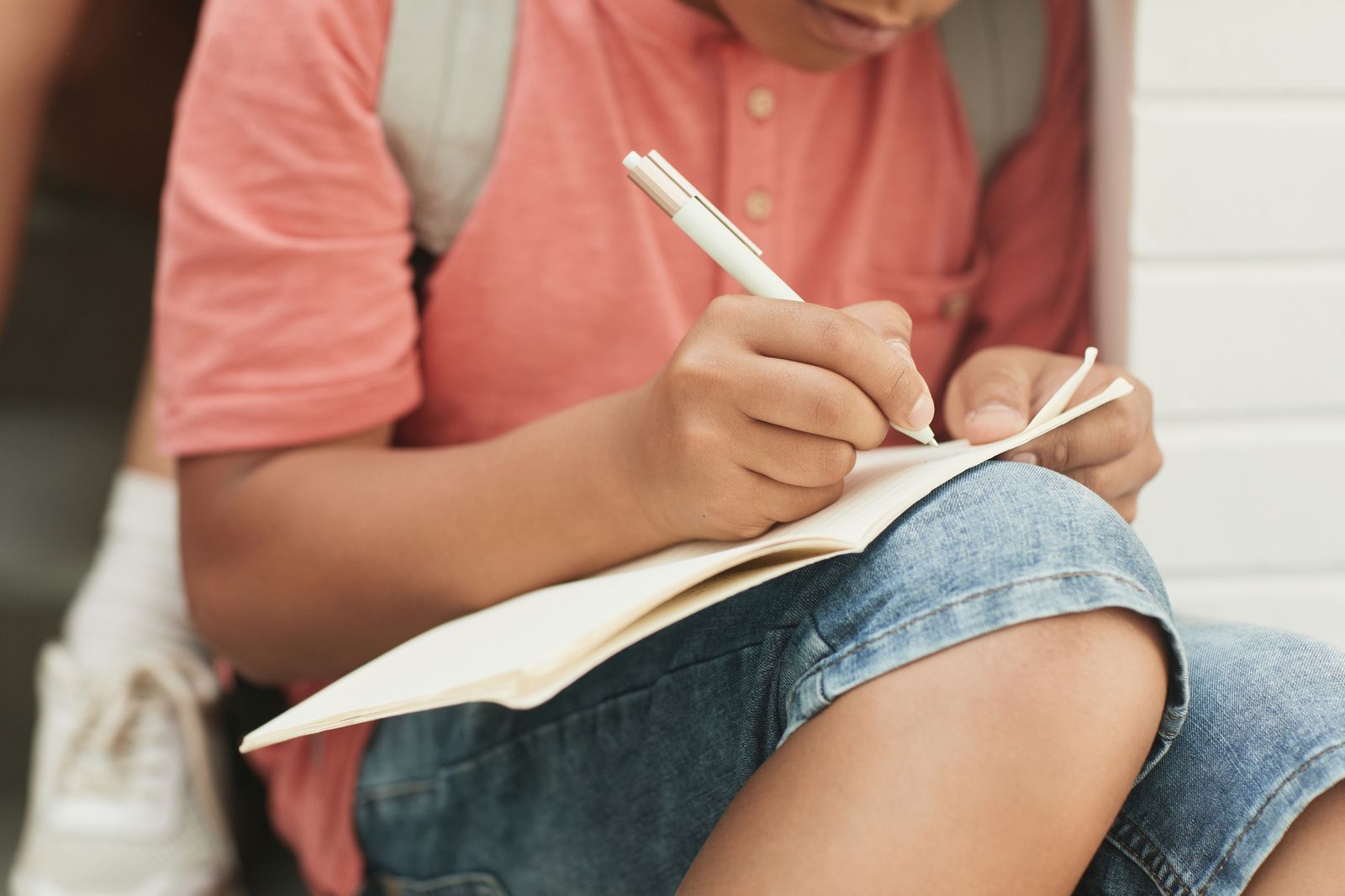 Illustrative image: reflective writing in a personal journal.
